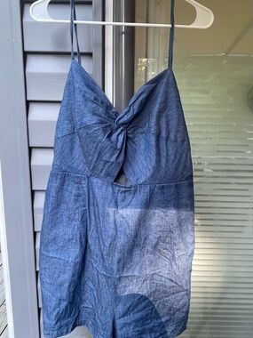 Adorable Romper with Pockets.Adorable with Peep hole which makes it Sexy!!